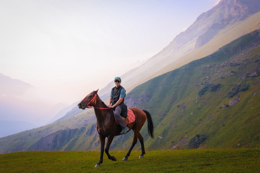 Horseback riding in mountains